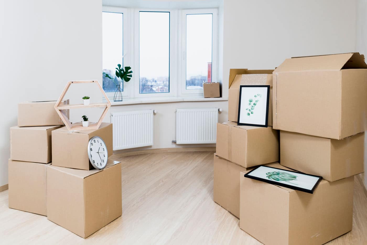 stack-moving-cardboard-boxes-new-apartment.jpg